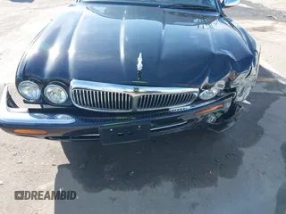 2003 Jaguar XJ 8 with VIN SAJDA14C03LF58706, listed as a IAAI auction lot 41619740 with 95,293 mi miles and . Bid and sale history available at DreamBid. Image 12.