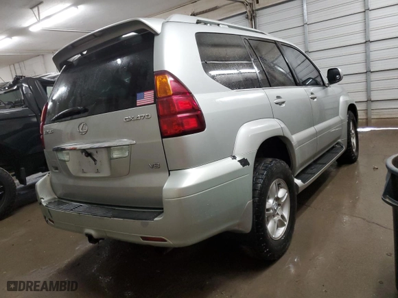 2003 Lexus GX 470 with VIN JTJBT20XX30004874, listed as a Copart auction lot 82016464 with 303,929 mi miles and Salvage Title. Bid and sale history available at carsss.com. Image 3.