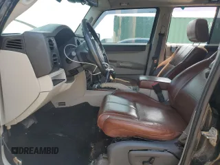 2007 Jeep Commander Limited z VIN 1J8HG58P27C520330, wystawiony jako Copart lot #54595745 z przebiegiem 168 908 mil mil oraz Szkoda całkowita • Salvage title. Historia ofert i sprzedaży dostępna na DreamBid. Obrazek 7.