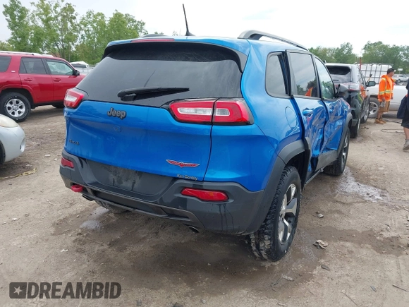 2017 Jeep Cherokee Trailhawk with VIN 1C4PJMBS2HW612792, listed as a IAAI auction lot 42373828 with 74,106 mi miles and . Bid and sale history available at DreamBid. Image 4.