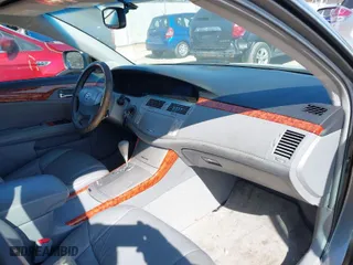 2005 Toyota Avalon XL with VIN 4T1BK36B65U027633, listed as a IAAI auction lot 41769335 with 89,904 mi miles. Bid and sale history available at carsss.com. Image 5.