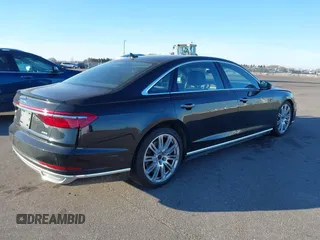 2019 Audi A8 L with VIN WAU8DAF8XKN018289, listed as a IAAI auction lot 41203292 with 28,758 mi miles. Bid and sale history available at carsss.com. Image 4.