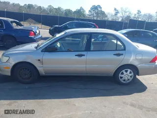 2003 Mitsubishi Lancer ES with VIN JA3AJ26E63U007501, listed as a IAAI auction lot 41771016 with 146,984 mi miles. Bid and sale history available at carsss.com. Image 14.