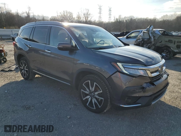 2020 Honda Pilot Touring 8-Passenger with VIN 5FNYF5H92LB024047, listed as a Copart auction lot 41630695 with 74,067 mi miles and Salvage Title. Bid and sale history available at DreamBid. Image 4.