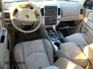 2005 Mercury Mariner Luxury z VIN 4M2CU56175DJ16949, wystawiony jako Copart lot #41901845 z przebiegiem 104 948 mil mil oraz Szkody całkowita. Historia ofert i sprzedaży dostępna na DreamBid. Obrazek 8.