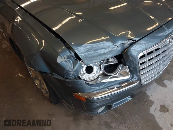 2005 Chrysler 300 with VIN 2C3JA63H95H111269, listed as a IAAI auction lot 41717805 with 102,740 mi miles. Bid and sale history available at carsss.com. Image 6.