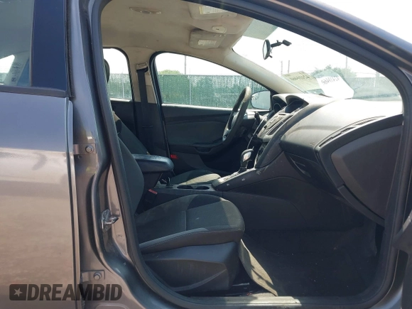 2013 Ford Focus SE with VIN 1FADP3F25DL337961, listed as a IAAI auction lot 42410460 with 143,446 mi miles and . Bid and sale history available at DreamBid. Image 5.