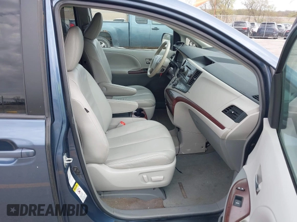 2014 Toyota Sienna Limited with VIN 5TDDK3DC5ES077601, listed as a IAAI auction lot 42163071 with 168,000 mi miles and . Bid and sale history available at DreamBid. Image 5.