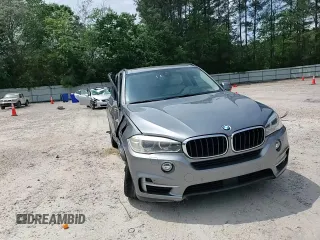 2014 BMW X5 xDrive35i z VIN 5UXKR0C54E0K46819, wystawiony jako Copart lot #54607325 z przebiegiem 135 489 mil mil oraz Szkody całkowita. Historia ofert i sprzedaży dostępna na DreamBid. Obrazek 14.