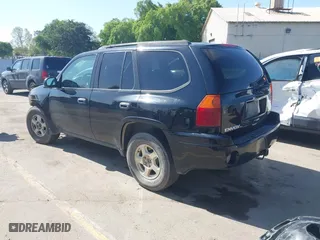 2004 GMC Envoy SLE with VIN 1GKDS13S942294303, listed as a IAAI auction lot 41992547 with 196,444 mi miles. Bid and sale history available at carsss.com. Image 3.