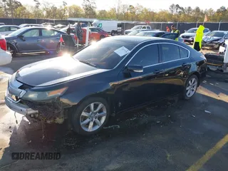 2012 Acura TL Tech Auto with VIN 19UUA8F5XCA007182, listed as a IAAI auction lot 41877378 with 196,455 mi miles. Bid and sale history available at carsss.com. Image 2.