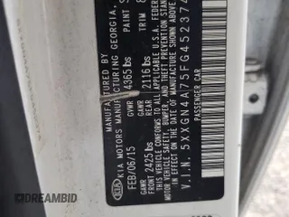 2015 Kia Optima EX z VIN 5XXGN4A75FG452374, wystawiony jako Copart lot #59928725 z przebiegiem 162 831 mil mil oraz Szkoda całkowita • Salvage title. Historia ofert i sprzedaży dostępna na DreamBid. Obrazek 12.