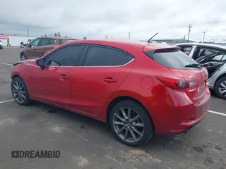 2018 Mazda 3 Touring with VIN 3MZBN1L33JM187560, listed as a IAAI auction lot 41692954 with 58,396 mi miles. Bid and sale history available at carsss.com. Image 3.