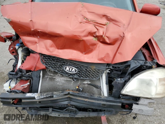 2007 Kia Rio LX with VIN KNADE123376248277, listed as a Copart auction lot 66108224 with 117,618 mi miles and Salvage Title. Bid and sale history available at carsss.com. Image 12.
