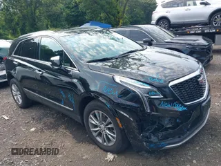 2022 Cadillac XT5 AWD Premium Luxury with VIN 1GYKNDRS9NZ153897, listed as a IAAI auction lot 39837633 with 81,342 mi miles and . Bid and sale history available at DreamBid. Image 1.