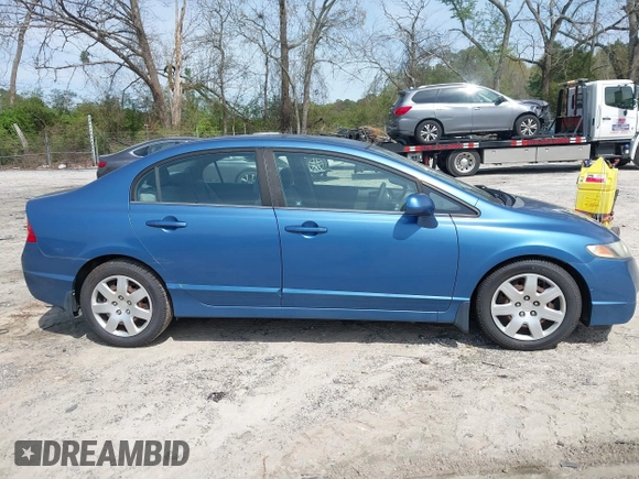 2009 Honda Civic LX z VIN 1HGFA16579L012949, wystawiony jako IAAI lot #41938215 z przebiegiem 180 795 mil mil oraz . Historia ofert i sprzedaży dostępna na DreamBid. Obrazek 13.
