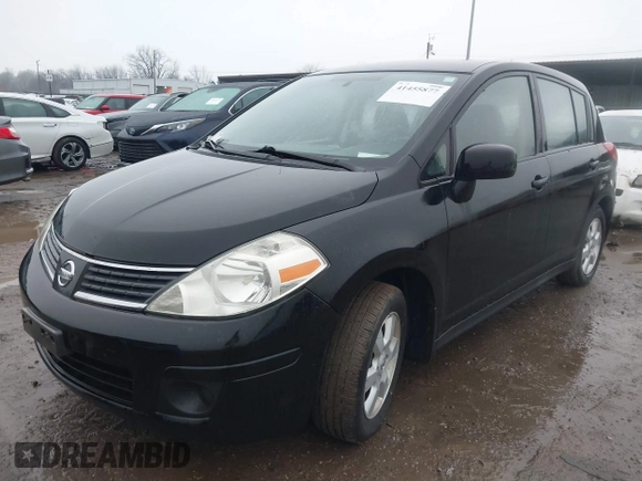 2009 Nissan Versa 1.8 SL with VIN 3N1BC13EX9L390055, listed as a IAAI auction lot 41455877 with 126,718 mi miles. Bid and sale history available at carsss.com. Image 2.