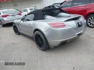 2008 Saturn Sky Red Line z VIN 1G8MG35X98Y101663, wystawiony jako IAAI lot #42357500 z przebiegiem 148 165 mil mil oraz . Historia ofert i sprzedaży dostępna na DreamBid. Obrazek 3.