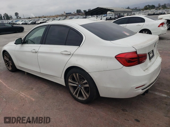 2018 BMW 3 Series 330i with VIN WBA8B9G57JNU57523, listed as a Copart auction lot 71773014 with 66,035 mi miles and Salvage Title. Bid and sale history available at carsss.com. Image 2.