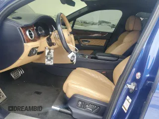 2017 Bentley Bentayga W12 z VIN SJAAC2ZV2HC014080, wystawiony jako Copart lot #44806115 z przebiegiem 63 077 mil mil oraz Szkody całkowita. Historia ofert i sprzedaży dostępna na DreamBid. Obrazek 7.