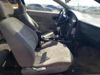 2001 Saturn SC with VIN 1G8ZR12731Z256766, listed as a Copart auction lot 70595904 with Not Provided miles and Salvage Title. Bid and sale history available at carsss.com. Image 7.