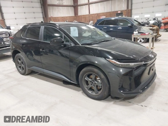 2024 Toyota bZ4X XLE with VIN JTMABACA1RA058537, listed as a IAAI auction lot 41882026 with 13,072 mi miles. Bid and sale history available at carsss.com. Image 1.