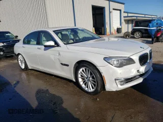 2013 BMW 7 Series 750i with VIN WBAYA8C55DC996693, listed as a Copart auction lot 80233423 with 140,925 mi miles and Salvage Title. Bid and sale history available at DreamBid. Image 4.