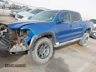 2018 Toyota Tacoma SR with VIN 3TMCZ5AN1JM124111, listed as a IAAI auction lot 41741973 with 90,175 mi miles. Bid and sale history available at carsss.com. Image 2.