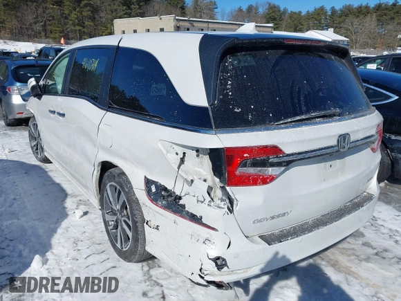 2023 Honda Odyssey Touring with VIN 5FNRL6H81PB008129, listed as a IAAI auction lot 41610714 with 57,273 mi miles and . Bid and sale history available at DreamBid. Image 3.