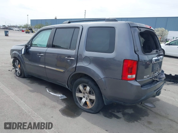 2015 Honda Pilot Touring with VIN 5FNYF3H91FB011847, listed as a IAAI auction lot 41841293 with 99,431 mi miles. Bid and sale history available at carsss.com. Image 3.