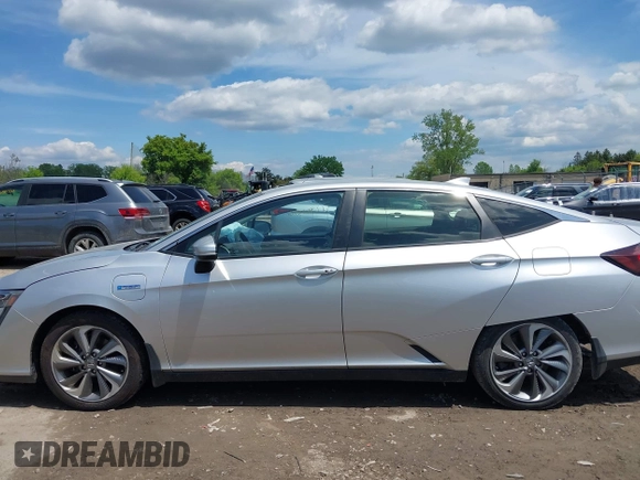 2018 Honda Clarity z VIN JHMZC5F14JC007026, wystawiony jako IAAI lot #42361556 z przebiegiem 74 132 mil mil oraz . Historia ofert i sprzedaży dostępna na DreamBid. Obrazek 14.