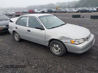 2000 Toyota Corolla VE with VIN 2T1BR12E3YC284075, listed as a IAAI auction lot 42544886 with Not provided miles and . Bid and sale history available at DreamBid. Image 1.