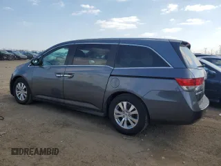 2014 Honda Odyssey EX-L with VIN 5FNRL5H64EB123541, listed as a Copart auction lot 52483705 with 77,996 mi miles and Salvage Title. Bid and sale history available at DreamBid. Image 2.