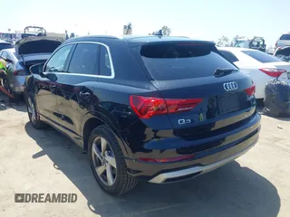 2019 Audi Q3 Premium with VIN WA1AECF33K1086047, listed as a IAAI auction lot 41905218 with 51,802 mi miles. Bid and sale history available at carsss.com. Image 3.
