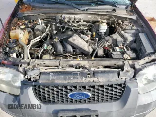 2006 Ford Escape XLT with VIN 1FMYU03136KD25536, listed as a Copart auction lot 56892805 with 187,216 mi miles and Salvage title. Bid and sale history available at DreamBid. Image 12.