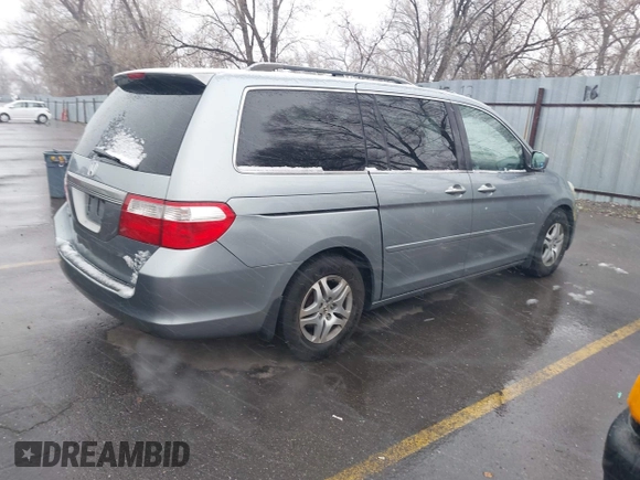 2006 Honda Odyssey EX-L with VIN 5FNRL386X6B096285, listed as a IAAI auction lot 41867716 with 215,284 mi miles. Bid and sale history available at carsss.com. Image 4.