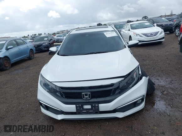 2019 Honda Civic EX-L z VIN 19XFC1F70KE202584, wystawiony jako IAAI lot #41727976 z przebiegiem 67 891 mil mil oraz . Historia ofert i sprzedaży dostępna na DreamBid. Obrazek 12.