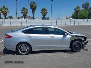 2014 Ford Fusion Titanium with VIN 3FA6P0K96ER248025, listed as a IAAI auction lot 42189061 with 64,351 mi miles and . Bid and sale history available at DreamBid. Image 14.