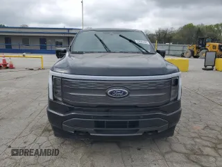 2023 Ford F-150 Lightning Pro z VIN 1FTVW1EV4PWG12935, wystawiony jako Copart lot #52685485 z przebiegiem Nie podano mil oraz Szkody całkowita. Historia ofert i sprzedaży dostępna na DreamBid. Obrazek 5.
