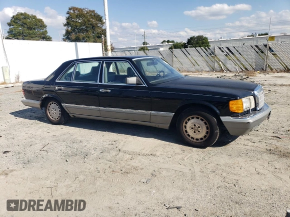 1987 Mercedes-Benz 560 with VIN WDBCA39D3HA355282, listed as a Copart auction lot 74798524 with 200,535 mi miles and Salvage Title. Bid and sale history available at DreamBid. Image 4.