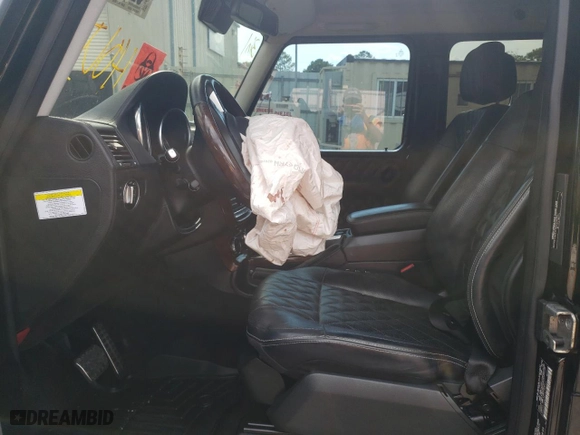 2014 Mercedes-Benz G-Class G 550 with VIN WDCYC3HF2EX214663, listed as a Copart auction lot 62703594 with 104,644 mi miles and Salvage Title. Bid and sale history available at carsss.com. Image 7.