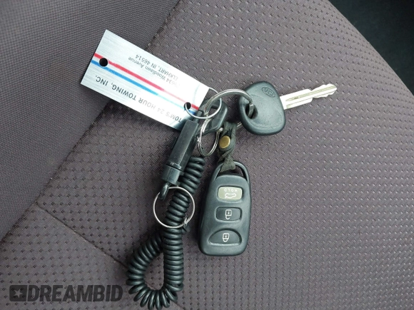 2010 Kia Forte EX z VIN KNAFU4A26A5065796, wystawiony jako IAAI lot #39824465 z przebiegiem 179 857 mil mil oraz . Historia ofert i sprzedaży dostępna na DreamBid. Obrazek 11.