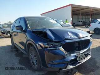 2020 Mazda CX-5 Touring z VIN JM3KFACM2L0746327, wystawiony jako IAAI lot #41996659 z przebiegiem 108 230 mil mil oraz . Historia ofert i sprzedaży dostępna na DreamBid. Obrazek 1.