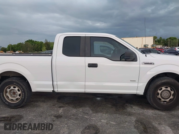 2015 Ford F-150 XL with VIN 1FTEX1CP7FFB56879, listed as a IAAI auction lot 42414408 with 212,042 mi miles and . Bid and sale history available at DreamBid. Image 13.