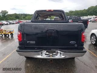 2001 Ford F-150 SuperCrew XLT with VIN 1FTRW08L71KF75304, listed as a Copart auction lot 57759074 with 0 mi miles and Non Repairable. Bid and sale history available at carsss.com. Image 6.