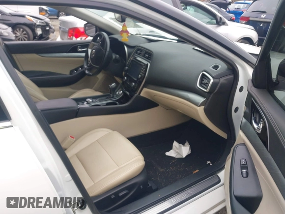 2016 Nissan Maxima S with VIN 1N4AA6AP2GC412533, listed as a IAAI auction lot 41831813 with 122,933 mi miles and . Bid and sale history available at DreamBid. Image 5.