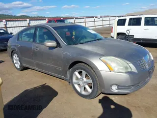 2004 Nissan Maxima SE with VIN 1N4BA41E34C899003, listed as a IAAI auction lot 41951346 with 186,746 mi miles. Bid and sale history available at carsss.com. Image 1.
