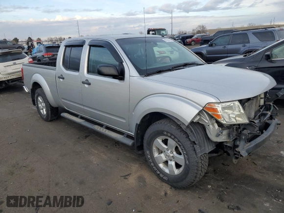 2010 Nissan Frontier SE with VIN 1N6AD0FVXAC420020, listed as a Copart auction lot 87324794 with 145,566 mi miles and Salvage title. Bid and sale history available at DreamBid. Image 4.