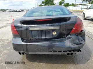 2005 Pontiac Grand Prix z VIN 2G2WS542651161577, wystawiony jako Copart lot #56522945 z przebiegiem 241 430 mil mil oraz Szkody całkowita. Historia ofert i sprzedaży dostępna na DreamBid. Obrazek 6.