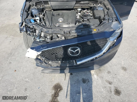 2018 Mazda CX-5 Touring with VIN JM3KFACM0J1409047, listed as a Copart auction lot 51233635 with NaN miles and Non Repairable. Bid and sale history available at carsss.com. Image 12.